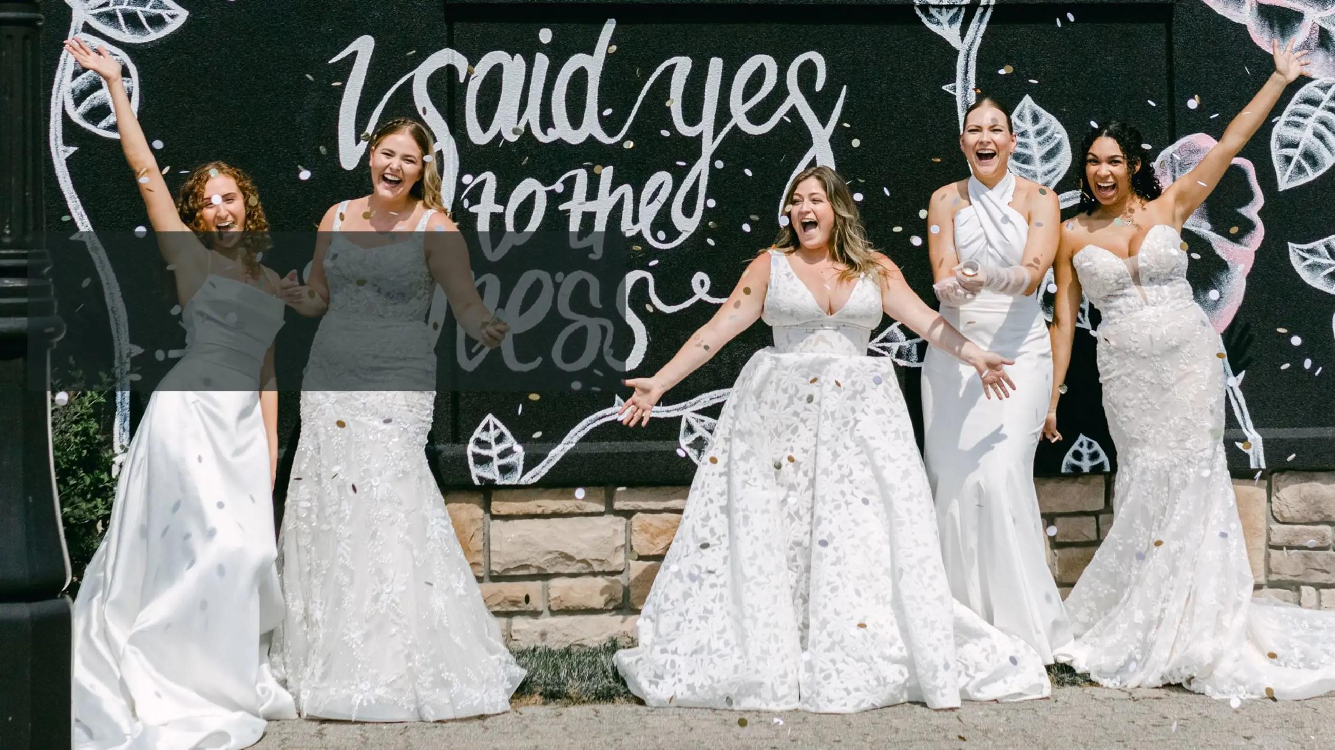 five girls wearing bridal gown